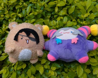 PRÉ-ENCOMENDA Mascote de pelúcia Oga e Bettel