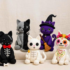 May include: Five crocheted cat figurines featuring distinct themes: a black skeleton cat with a red bow, a split grey and black Frankenstein cat, a white ghost cat holding a candle, a purple witch cat with a broom, and a white sugar skull cat.