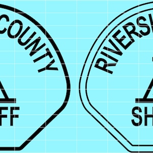 May include: Two black and white Riverside County Sheriff badges. The badges feature the words "Riverside County" in a semi-circle at the top, with a bell and cross design in the center, and the word "Sheriff" at the bottom.