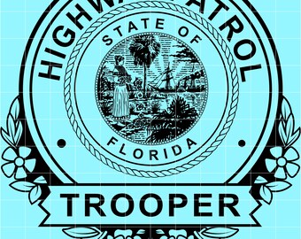 May include: Black and white Florida Highway Patrol Trooper emblem on a light blue background. The emblem features a circular design with the words "HIGHWAY PATROL" and "STATE OF FLORIDA". The word "TROOPER" is displayed on a banner.