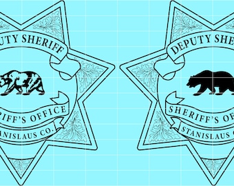 May include: Two Deputy Sheriff badges with a star shape and a light blue background. Each badge features a bear silhouette, the words "Deputy Sheriff" and "Sheriff's Office Stanislaus Co."