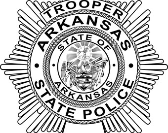 May include: A black and white Arkansas State Police trooper badge. The badge is circular with the words "Trooper Arkansas State Police" around the outer edge. The center features the state seal.
