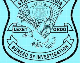 May include: A black and white emblem featuring an eagle with outstretched wings, the words "STATE OF GEORGIA" and "BUREAU OF INVESTIGATION". The emblem includes the text "LEXET ORDO" and a circular seal with the words "CONSTITUTION", "JUSTICE", and "MODERATION".