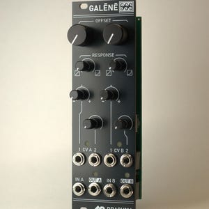 May include: A black electronic module with the text "GALĒNĒ" and "OFFSET" at the top. It has several knobs and input/output jacks. The text "RESPONSE", "1 CVA 2", "1 CV B 2", "IN A", "OUT A", "IN B", and "OUT B" are also visible.