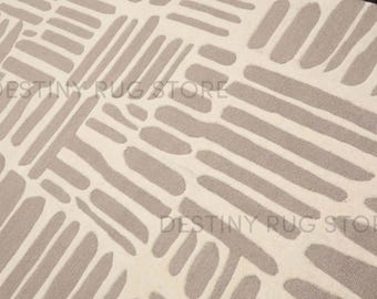 Carpette en laine tuftée à la main avec motif abstrait moderne, tapis contemporain neutre fait main pour le salon
