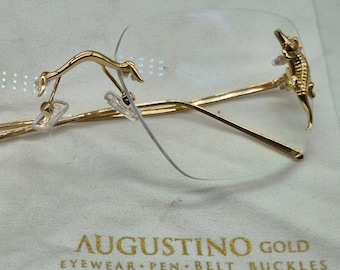18 kt solid gold rimless eye wear.