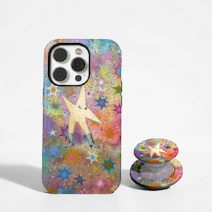 May include: A phone case and pop socket featuring a whimsical star character with boots against a colorful background of stars. The case and pop socket have a vibrant, multi-colored design with a playful aesthetic.