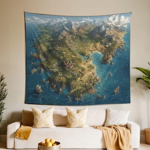 May include: A large tapestry depicting a detailed fantasy map of a coastal region with mountains, forests, and water. The map features a blue ocean, green landmasses, and white-capped mountains. The tapestry is hanging above a white sofa with decorative pillows.