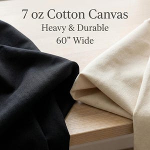 May include: Close-up of black and beige cotton canvas fabric. The text on the image reads: "7 oz Cotton Canvas, Heavy & Durable, 60" Wide."