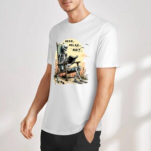 Tropical goth vacation tee with a skeleton book lover sitting in a wooden deck chair surrounded by wildflowers and warm earthy tones