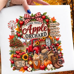 May include: A white fabric surface featuring a colorful graphic of a red truck, a wooden crate, a barrel of apples, a lantern, a mug of cider, a pumpkin, and boots. The text reads Farm Fresh Apple Orchard, Pick Your Own, Hay Rides, Fresh Cider, Pumpkin Patch.