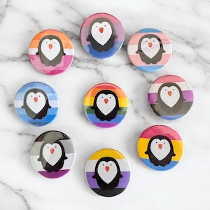 Penguin pride pin badge.