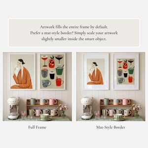 May include: Two framed wall art prints featuring a person in an orange striped robe drinking coffee and a collection of various coffee mugs. Below, a white espresso machine sits next to a wooden shelf holding eight assorted ceramic mugs.