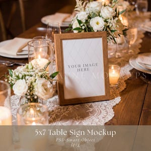 May include: A wooden 5x7 table sign mockup with the text "YOUR IMAGE HERE" displayed on a white background. The sign is on a wooden table with floral arrangements, candles, and a lace runner. The text "5x7 Table Sign Mockup" is at the bottom.