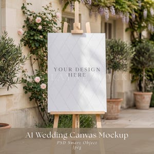 Puede incluir: Un caballete de madera sostiene un lienzo blanco con un patrón de diamantes y el texto "YOUR DESIGN LA HERE". La escena es al aire libre, rodeada de vegetación y flores, ideal para una boda o evento.