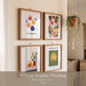 May include: Four framed art prints with botanical and fruit illustrations hang on a wall. The prints are in wooden frames and feature colorful designs of figs, oranges, and a palm leaf. The text "ART BOHÈME" is visible on two of the prints.