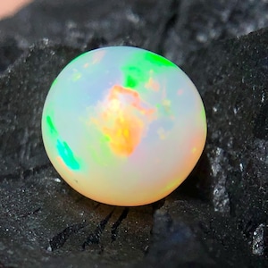 Natural ethiopian opal sphere, 1.65 Ct white color with rainbow fire opal ball (7.50 MM)