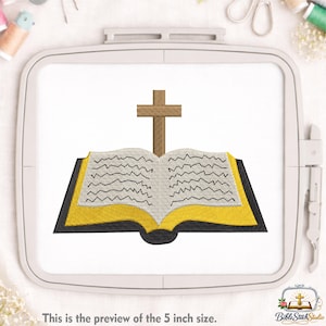 Puede incluir: Un libro abierto con una cubierta dorada y negra, coronado por una cruz marrón. Las páginas son beige con líneas negras. El texto "This is the preview of the 5 inch size" está en la parte inferior. El logotipo de Bible Stitch Studio está en la esquina inferior derecha.