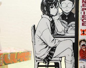 Dan da dan  themed bookend set