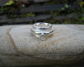 Anillo tórico giratorio de plata de ley