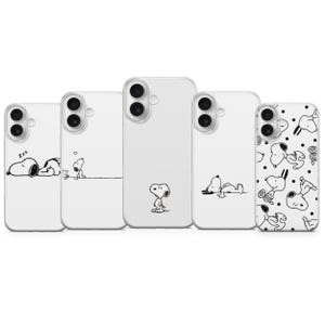 May include: Five white phone cases with black Snoopy designs. Each case features a different Snoopy illustration, including Snoopy sleeping, Snoopy with a heart, Snoopy standing, Snoopy relaxing, and a pattern of Snoopy.