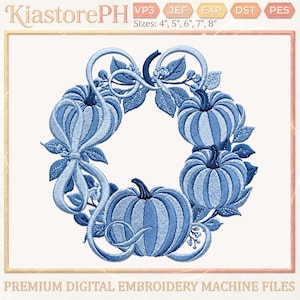 May include: A digital embroidery design featuring a wreath of three blue pumpkins, leaves, and swirling vines. The text KiastorePH is at the top, with file formats VP3, JEF, EXP, DST, PES and sizes 4", 5", 6", 7", 8" listed. Premium digital embroidery machine files.