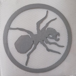 Strykbara reflexmärken med The Prodigy Ant-logotyp (2 st)
