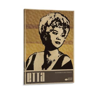 May include: A vintage-style wall art print featuring a black and white image of Etta James. The artwork has a sepia-toned background with geometric patterns and horizontal stripes. The name "Etta" is printed in a bold, stylized font.