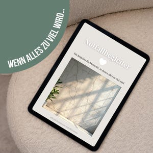 May include: A black tablet displaying the text "Notfallbegleiter" in white, with the phrase "Wenn alles zu viel wird..." in a green semi-circle. The tablet's screen shows an image of a room with a plant and sunlight. The text "Ein Begleiter für Momente, in denen alles zu viel wird" is also visible.