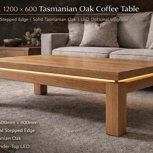 May include: A rectangular Tasmanian Oak coffee table with an architectural stepped edge and optional under-top LED lighting. The table is 47 inches long, 24 inches wide, and 16 inches high. The text on the image reads "ASHEK 1200 x 600 Tasmanian Oak Coffee Table".