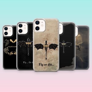 May include: A collection of phone cases with dragon designs. The cases feature black and gold dragon illustrations, with some displaying the text "Fly or die...". The cases have a clear, protective design.