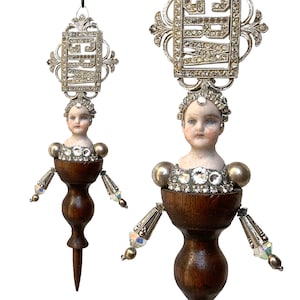 assemblage art doll ornament, fancy handmade rhinestone queen, wood finial doll head ornament by Elizabeth Rosen