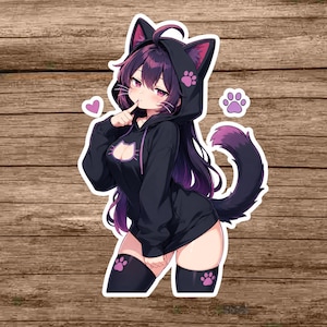 May include: A die-cut sticker featuring an anime-style character with long dark purple hair, wearing a black cat-ear hoodie with a cutout chest detail, black thigh-high socks with pink paw prints, and a matching tail, accented by a pink heart and paw icon.