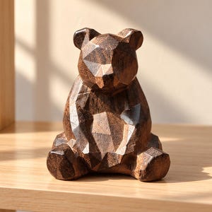 May include: A dark brown wooden bear figurine featuring a faceted, geometric surface design. The bear is depicted in a seated position with visible wood grain texture throughout its angular, multi-sided form, creating a structured appearance.