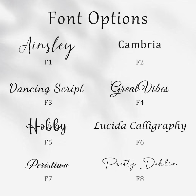 May include: An image displaying eight font options, including Ainsley, Cambria, Dancing Script, Great Vibes, Hobby, Lucida Calligraphy, Peristiwa, and Pretty Dahlia. Each font is accompanied by a code, such as F1 or F2, for easy reference.