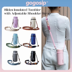 May include: Gogosip Slides Insulated Tumbler with adjustable shoulder strap. Six cylindrical bottles in lavender, cream, light blue, royal blue, gray, and black, each with a unique patterned strap. One light pink tumbler is worn over the shoulder.