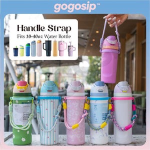 May include: A collection of colorful water bottles with handle straps. The bottles come in various colors and patterns, including floral, striped, and solid colors. The text "Handle Strap Fits 10-40oz Water Bottle" is displayed. One bottle is held by a person.