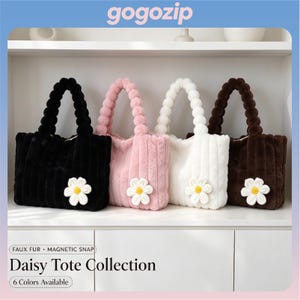 May include: Four faux fur tote bags in black, pink, white, and brown, each featuring a white daisy appliqué with a yellow center. The bags have textured vertical stripes and rounded, plush handles. Text reads: gogozip, Daisy Tote Collection.