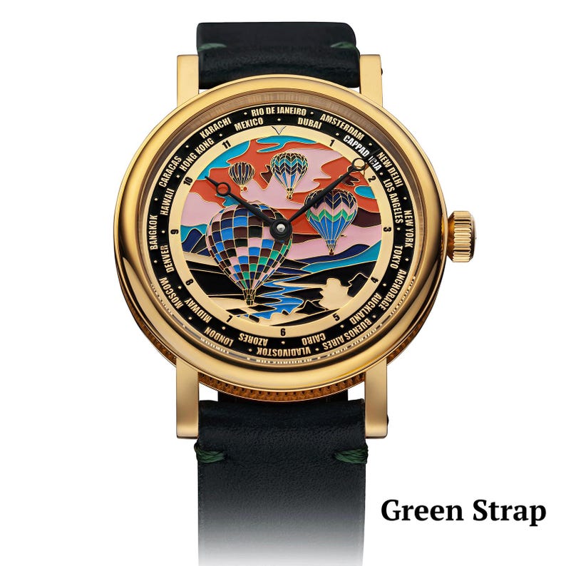 Green strap on wrist watch