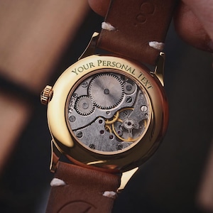 Engraved watch