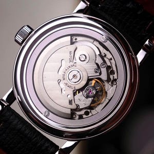 Mechanical movement on back side