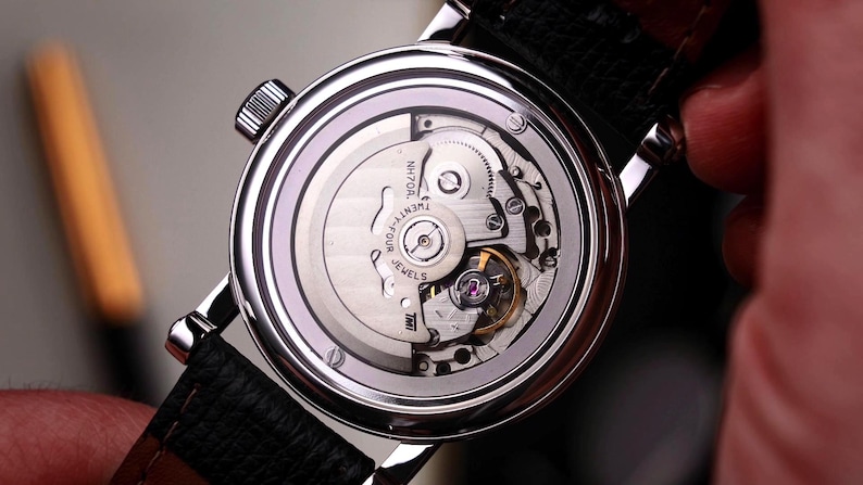 Mechanical movement on back side