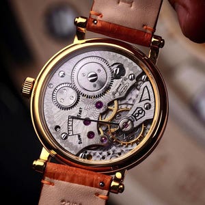 Mechanical watch on back side