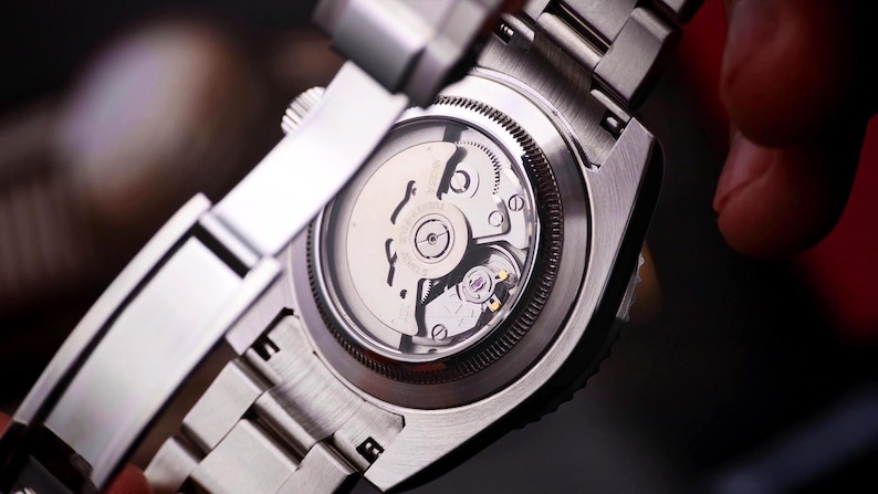 Automatic movement on back side