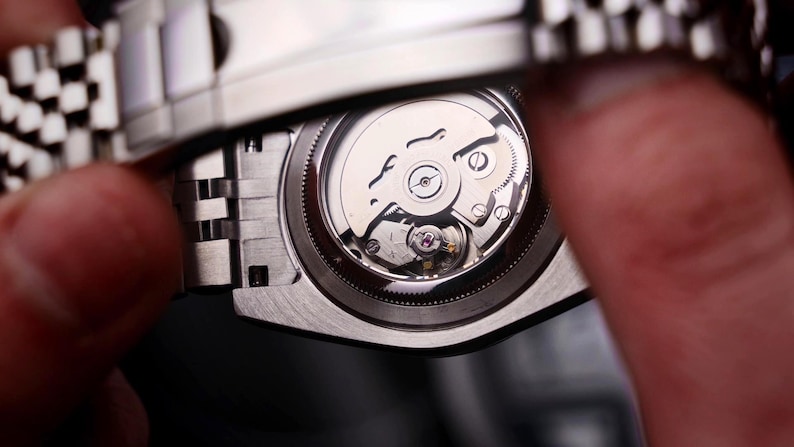 Mechanical movement on back side
