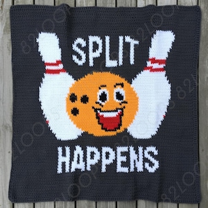 May include: Dark grey crocheted blanket featuring a bowling design. The design includes a smiling bowling ball, two white bowling pins with red stripes, and the words "SPLIT HAPPENS" in white, all on a dark grey background.