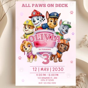 May include: A pink birthday invitation featuring cartoon characters from the Paw Patrol series. The invitation includes the text "ALL PAWS ON DECK" and "OLIVIA IS TURNING 3". The date and time of the party are also included.