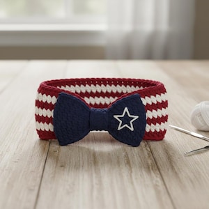 May include: A handmade crochet basket with red and white stripes, featuring a navy blue bow with a white star. The basket is designed with a patriotic theme, perfect for home decor or storage.
