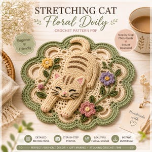 May include: A crochet pattern PDF titled STRETCHING CAT Floral Doily featuring a beige cat with brown stripes stretching on a cream-colored circular doily with a scalloped sage green border, decorated with small yellow, purple, and pink flowers.