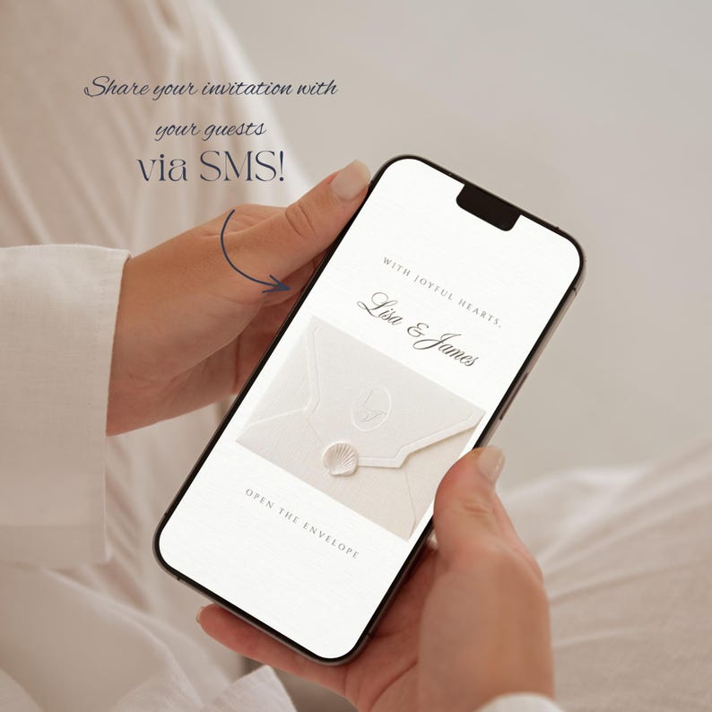 May include: A smartphone screen displays a digital wedding invitation featuring the text "With joyful hearts, Lisa & James" and "Open the envelope" above an image of a cream-colored envelope sealed with a shell-shaped wax seal.